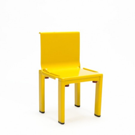 Yellow plastic children's chair by Kartell
