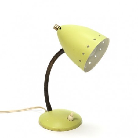 Yellow table lamp with perorated edge