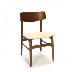 Teak chair with cream-colored upholstery