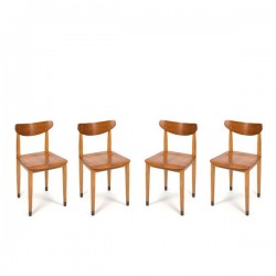 Set van 4 houten stoelen op koperen voetjes