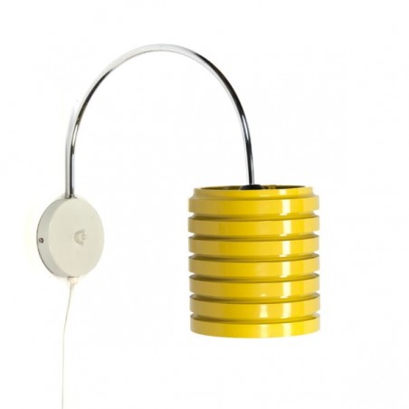 Wall lamp with yellow plastic shade