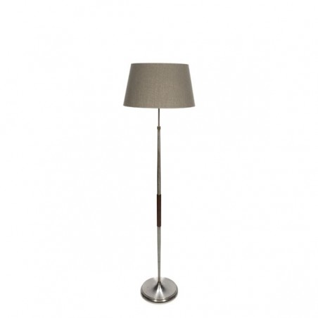Floor lamp on metal base with teak detail