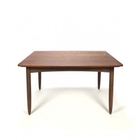 Teak dining table with extendable sheets