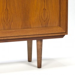 Small teak cabinet with sliding doors