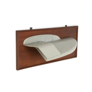 Industrial wall object on teak