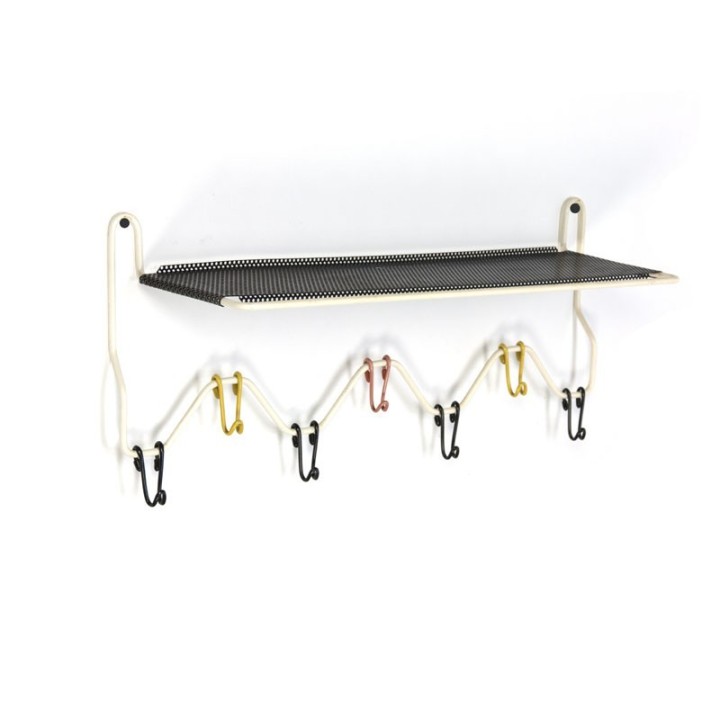 Coat rack with perforated shelf