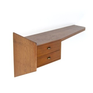 Vintage teak cabinet on the wall