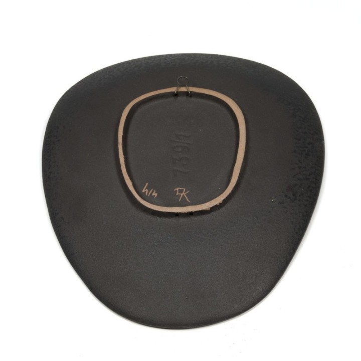 Vintage wandbordje van aardewerk