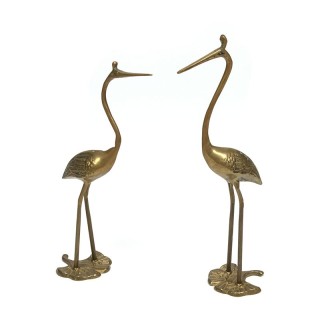 Two vintage sculptures of cranes