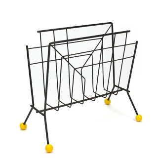 Black metal vintage newspaper rack with yellow detail
