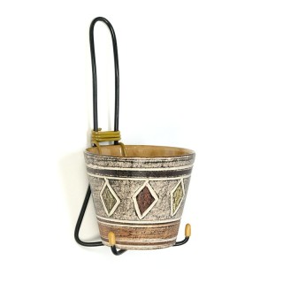 Vintage flowerpot in wall holder from the fifties