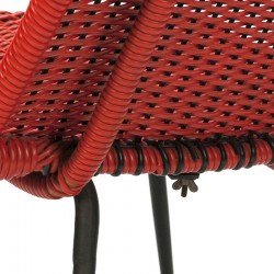 Red vintage chair made of braided plastic wire