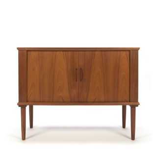 Danish vintage cupboard in teak with rolling doors
