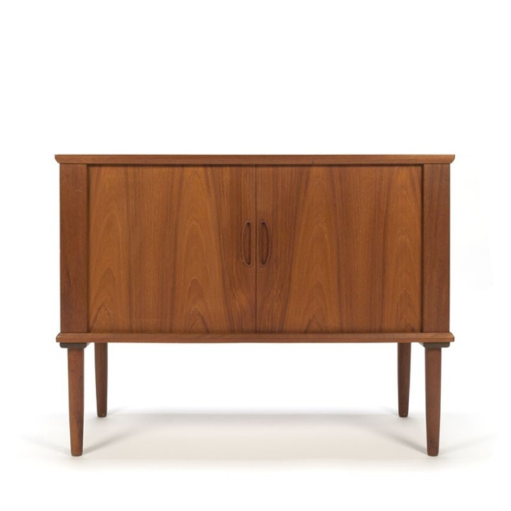 Danish vintage cupboard in teak with rolling doors