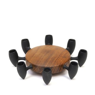 Vintage teak and cast iron candlestick design Jens Quistgaard