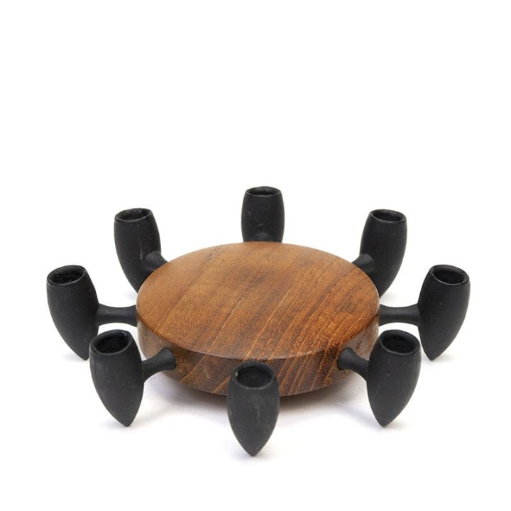 Vintage teak and cast iron candlestick design Jens Quistgaard