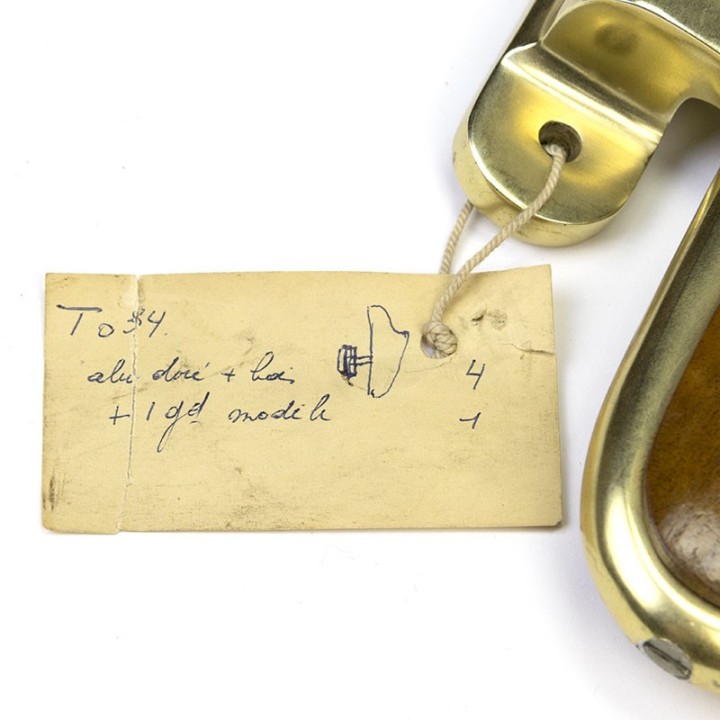 Set of vintage door handles in teak and brass from the fifties