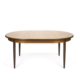 Vintage large oval model extendable dining table in teak