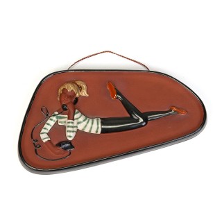 Vintage earthenware wall tile with a girl