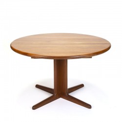Round extendable vintage dining table on a star base