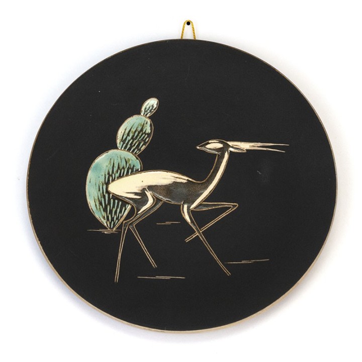 Round vintage wall tile with gazelle