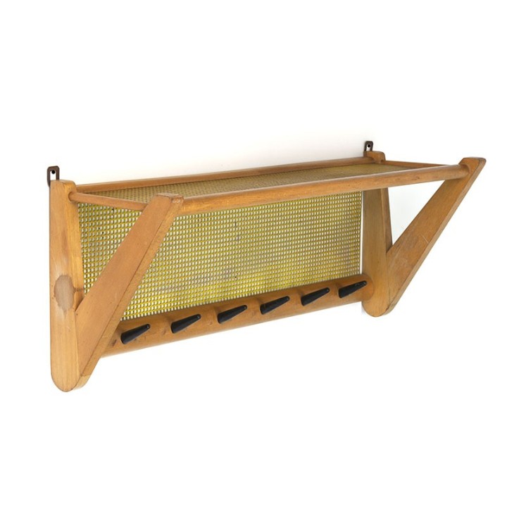 Vintage coat rack with perforated metal hat shelf