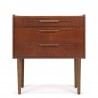 Small Danish chest of drawers in teak on a high leg