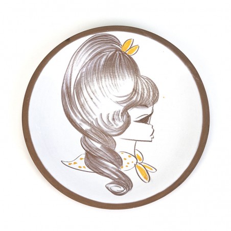 Vintage ceramic wall plate with girl