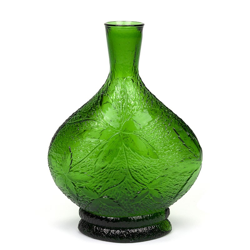 Groen glazen vintage met reliëf afbeelding - Retro