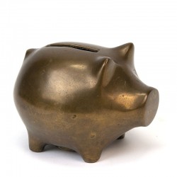 Small vintage piggy bank as a brass pig