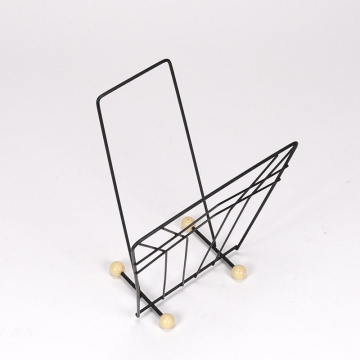 Magazine rack vintage fifties on ball foot