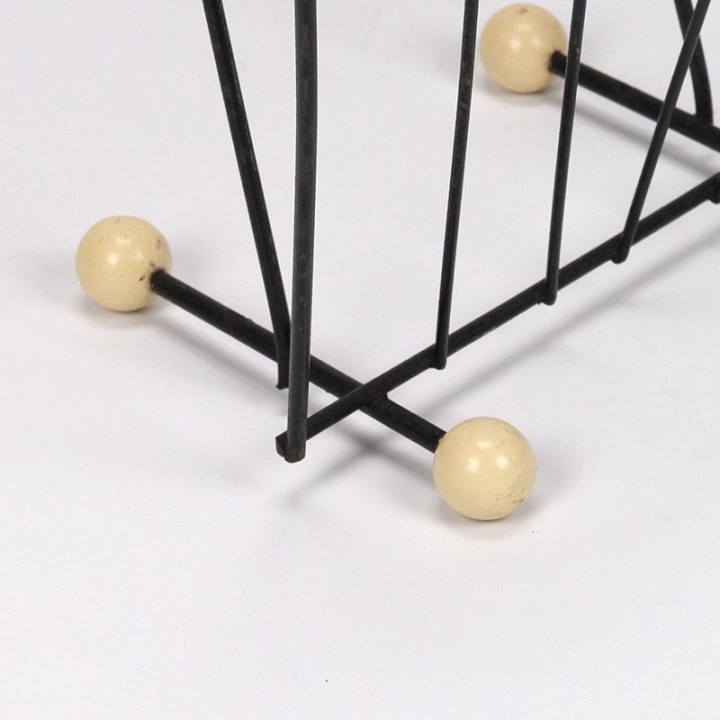 Magazine rack vintage fifties on ball foot