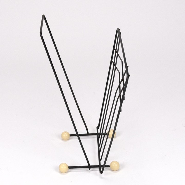 Magazine rack vintage fifties on ball foot