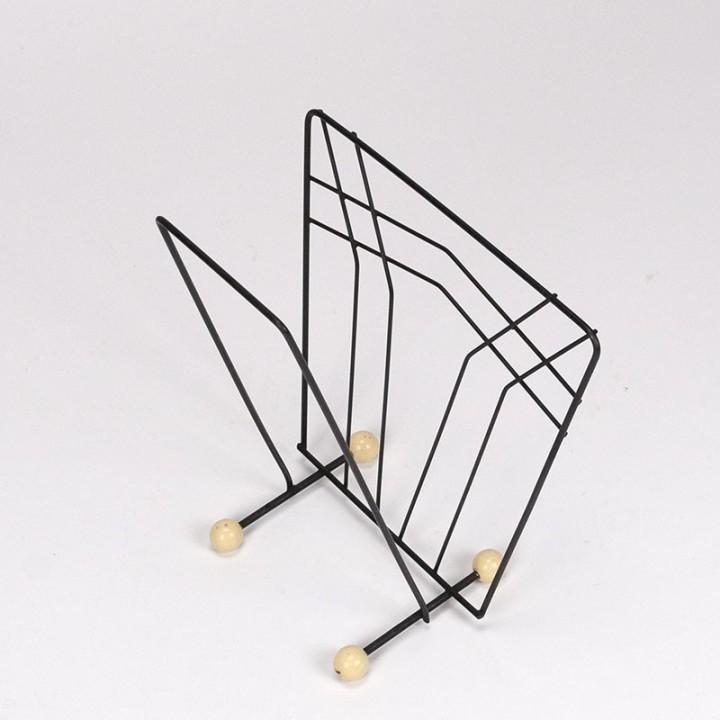 Magazine rack vintage fifties on ball foot