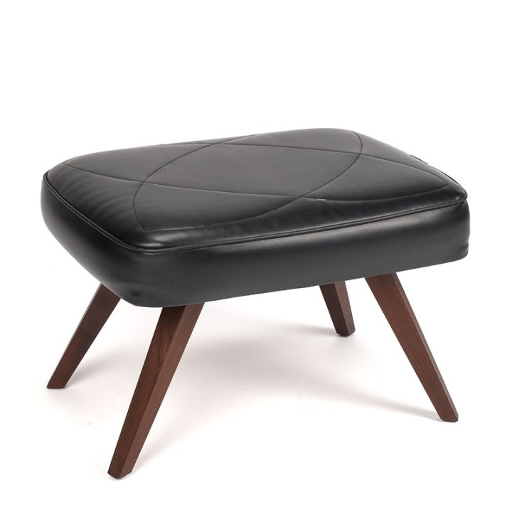 Black Danish vintage hocker on slanted legs