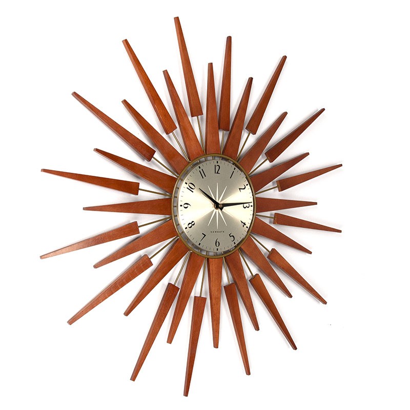 Vintage sun shaped wall clock in teak