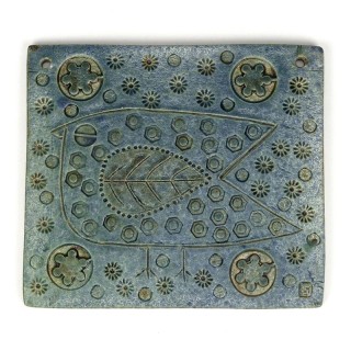 Vintage Scandinavian wall tile of a bird