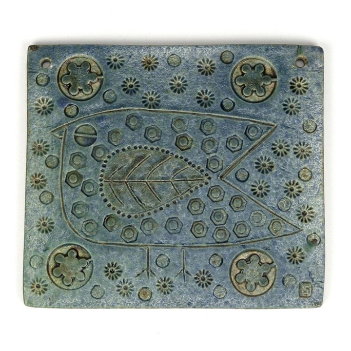 Vintage Scandinavian wall tile of a bird