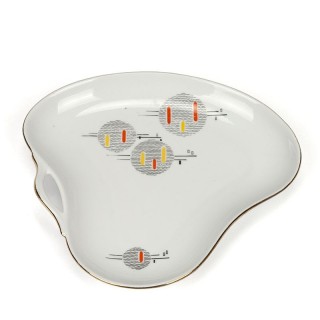 Small vintage earthenware plate from the 1950s