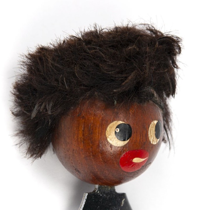 Scandinavian vintage bottle cap opener as a head