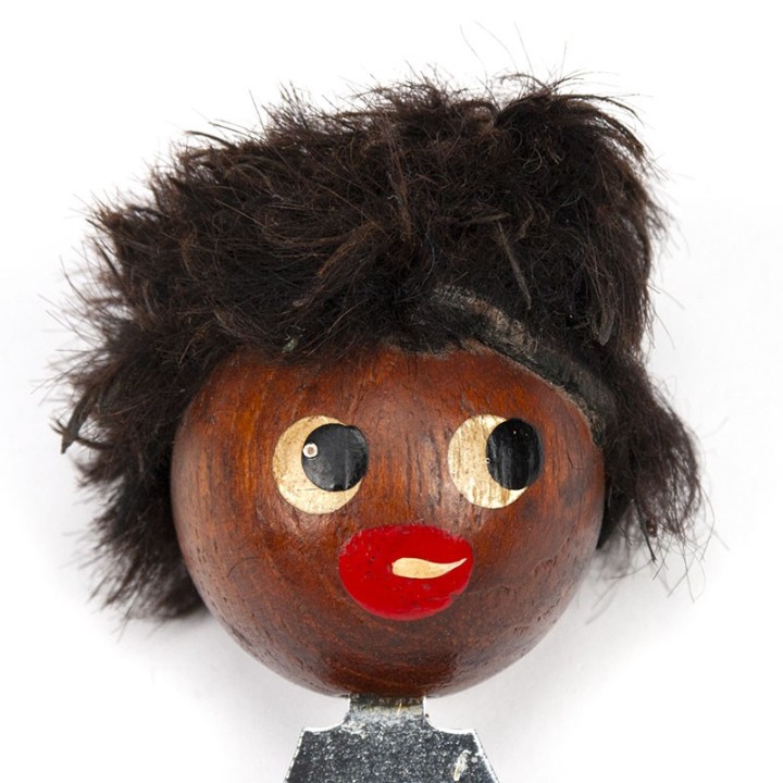Scandinavian vintage bottle cap opener as a head
