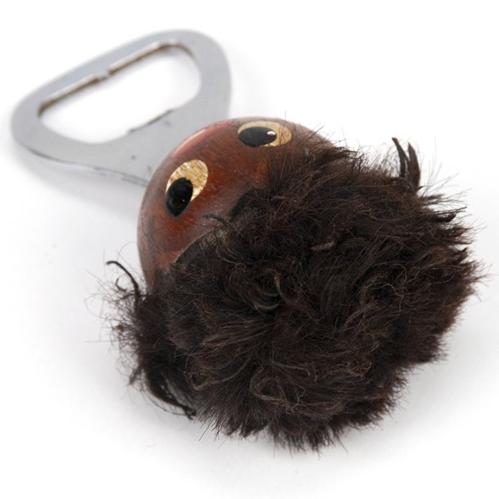 Scandinavian vintage bottle cap opener as a head