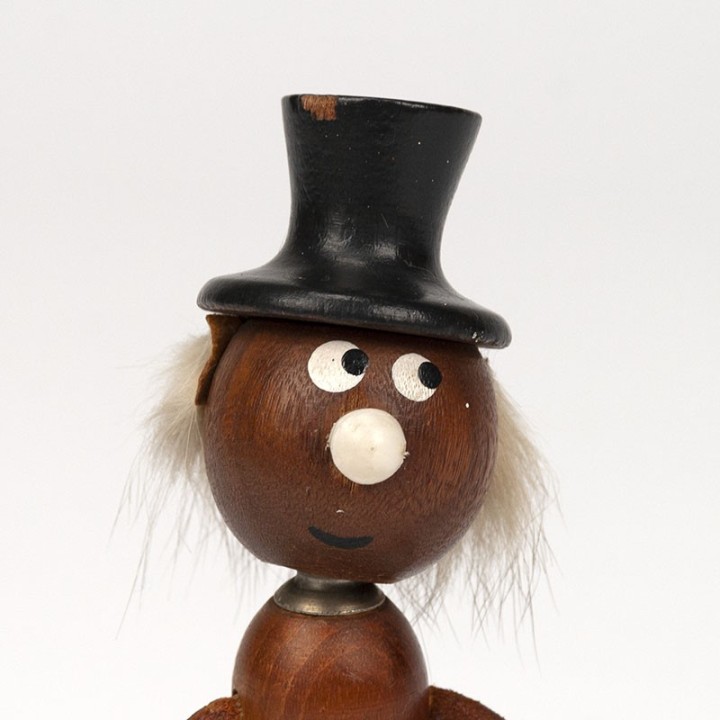 Vintage crown bottle opener as a guitar man