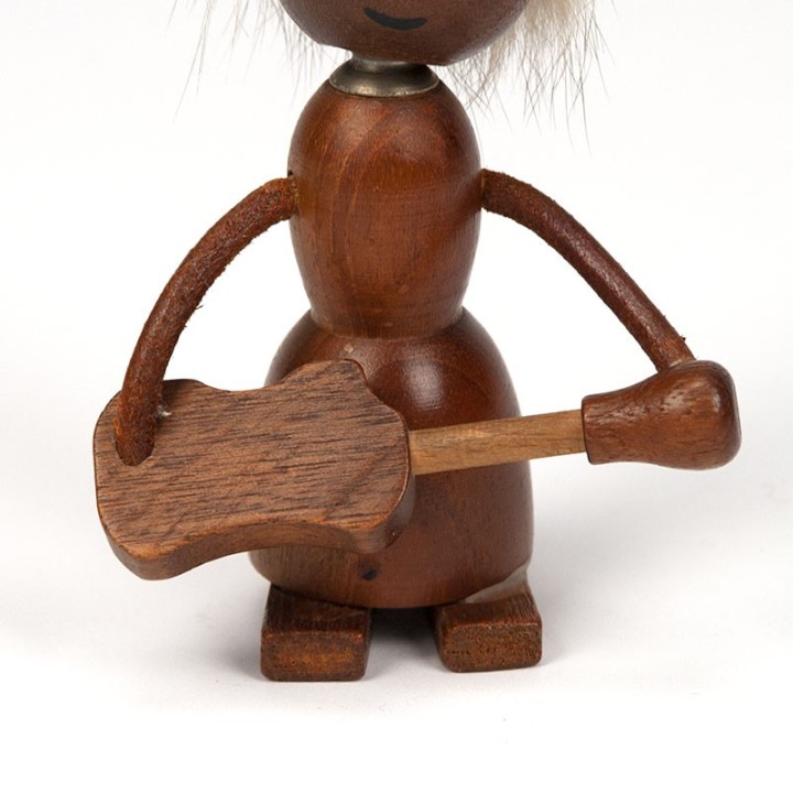 Vintage crown bottle opener as a guitar man