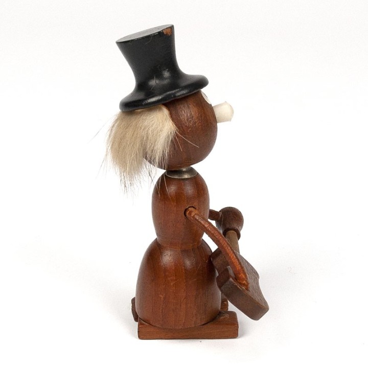 Vintage crown bottle opener as a guitar man