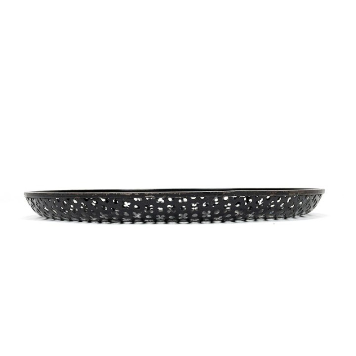 Perforated metal vintage bowl in the style of Mathieu Mategot