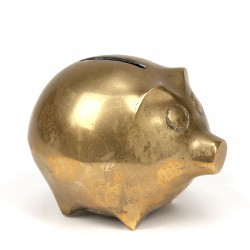 Brass vintage piggy-bank as a pig