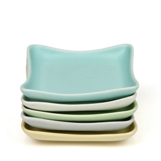 Set kleine vintage serveerschaaltjes in pastel kleuren van