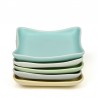 Set of small vintage serving dishes in pastel colors from