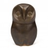 Abstractly designed vintage sculpture of an owl